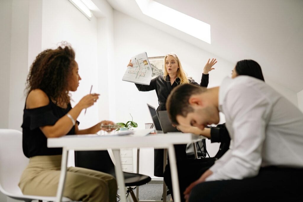 People in a heated debate while working together in a office

Photo by Yan Krukau from Pexels